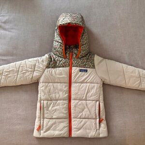 Patagonia Jacket with Floral Hood, light pink body and orange trim. Size 5/6
